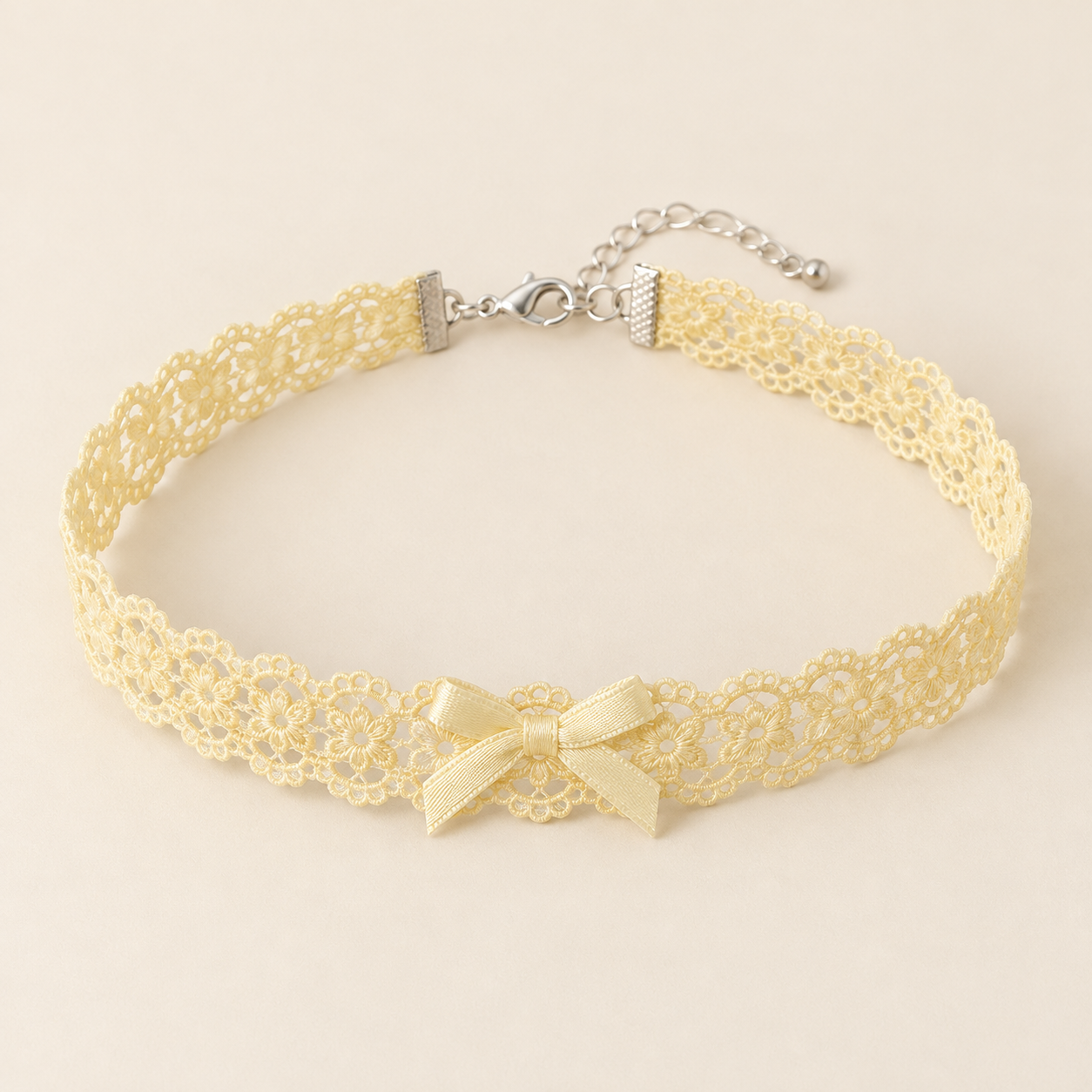 Buttercup Bow, butter yellow cotton blend lace with a small matching satin bow