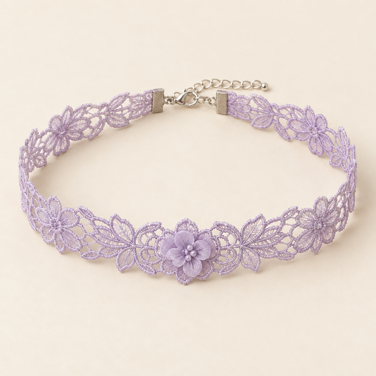Lilac Bloom, pale lilac polyester flower lace with one central small fabric flower